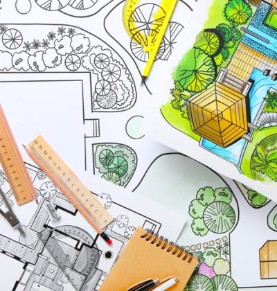 Plans of landscape designer with stationery, closeup